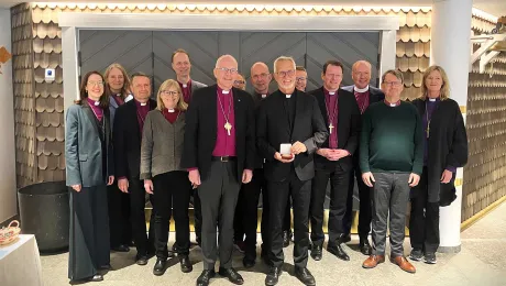 (Front row) Former LWF General Secretary Rev. Dr Martin Junge (right) received the St Erik award from Church of Sweden Archbishop Dr Martin Modéus (left). Photo: Fredrik Lidé