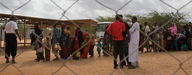 New arrivals from Somalia wait to be registered at Dadaab during the peak influx in August 2011. Â© LWR/Jonathan Ernst