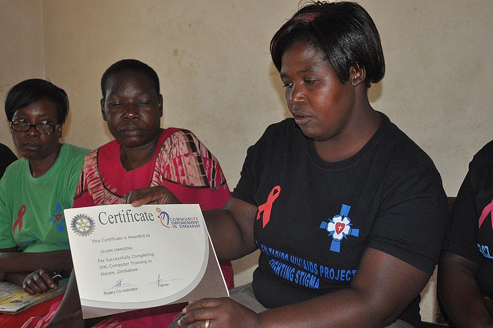 A member of the ELCZ Mufakose parish self-help group shows her recently acquired skills-training certificate. Â© LWF/Stanley Kwenda