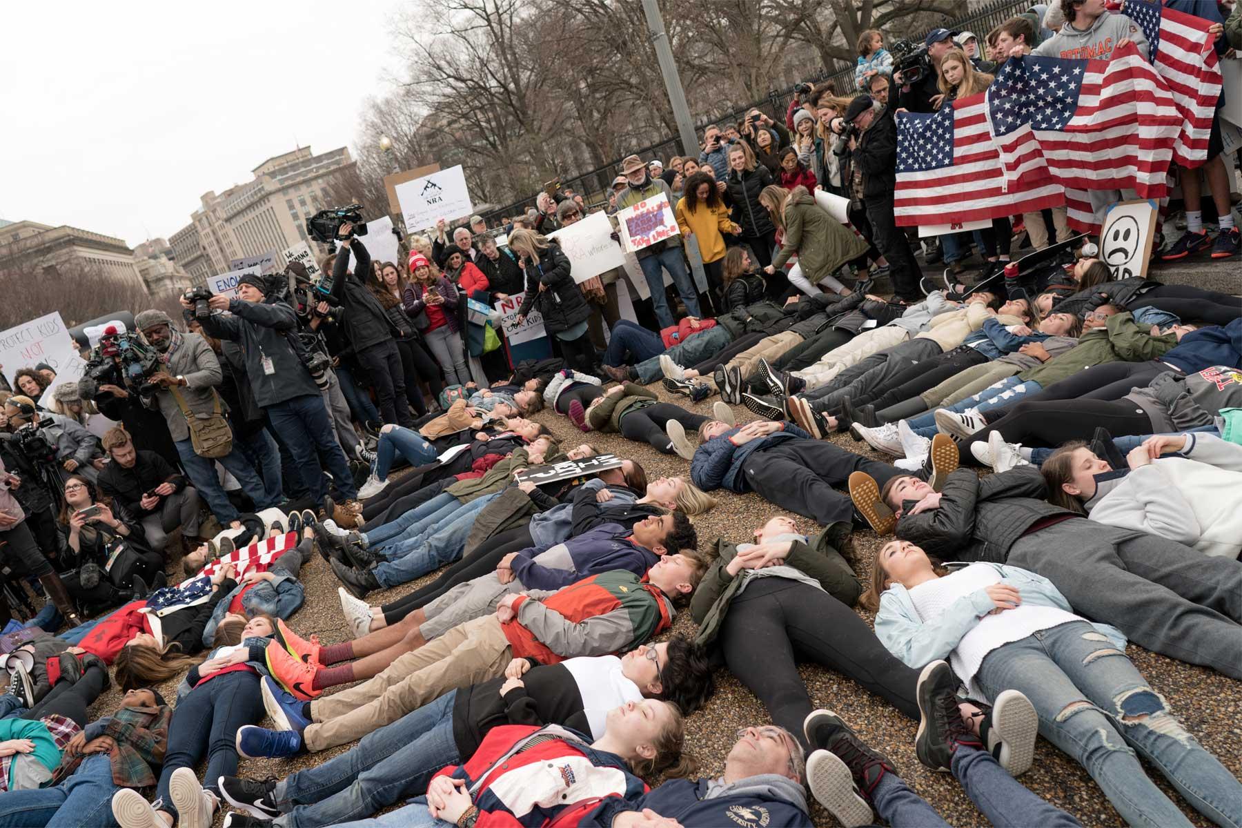 A lie-in in front of the White House, organized by students in Washington after the school shooting in Florida, calls for more legislation on privately owned firearms. Photo: Lorie Shaull/ Flickr