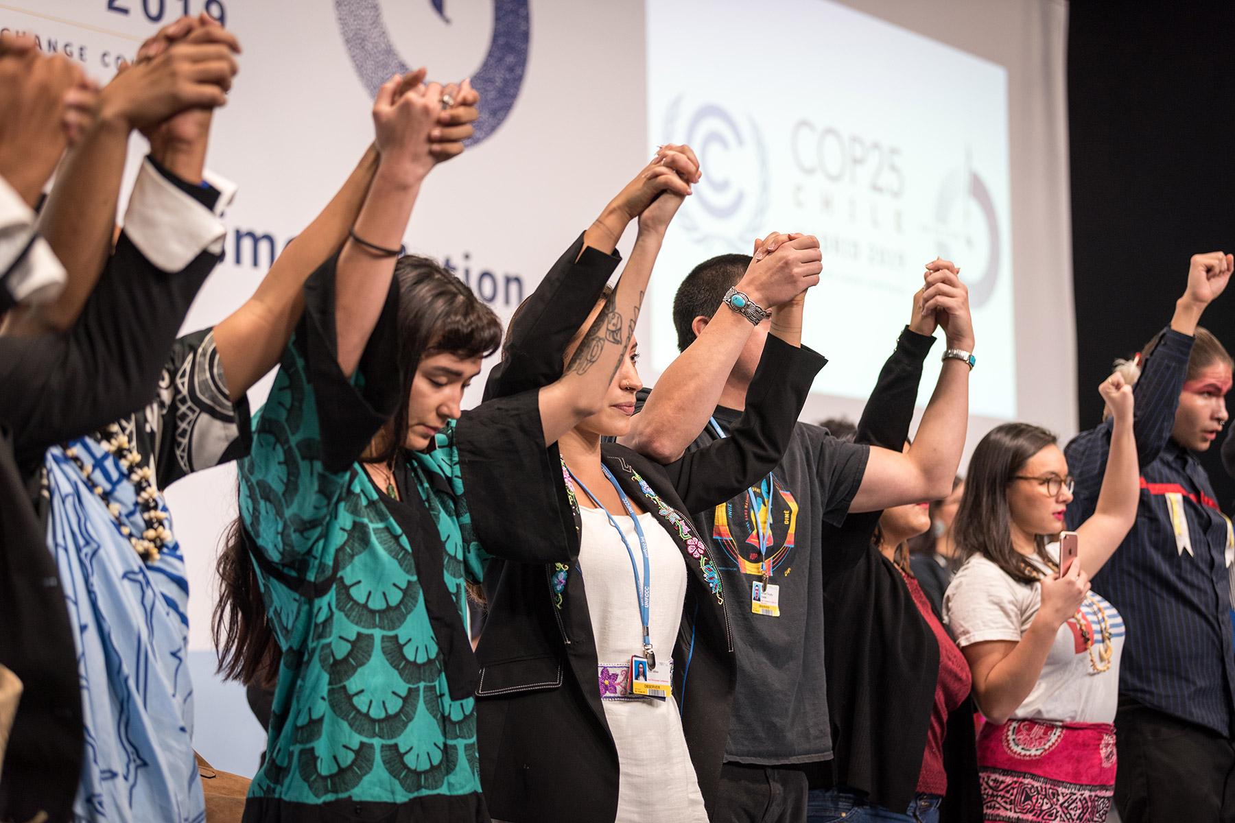 People of faith standing together for climate justice during COP25 in Madrid, Spain. Photo: LWF/Albin Hillert