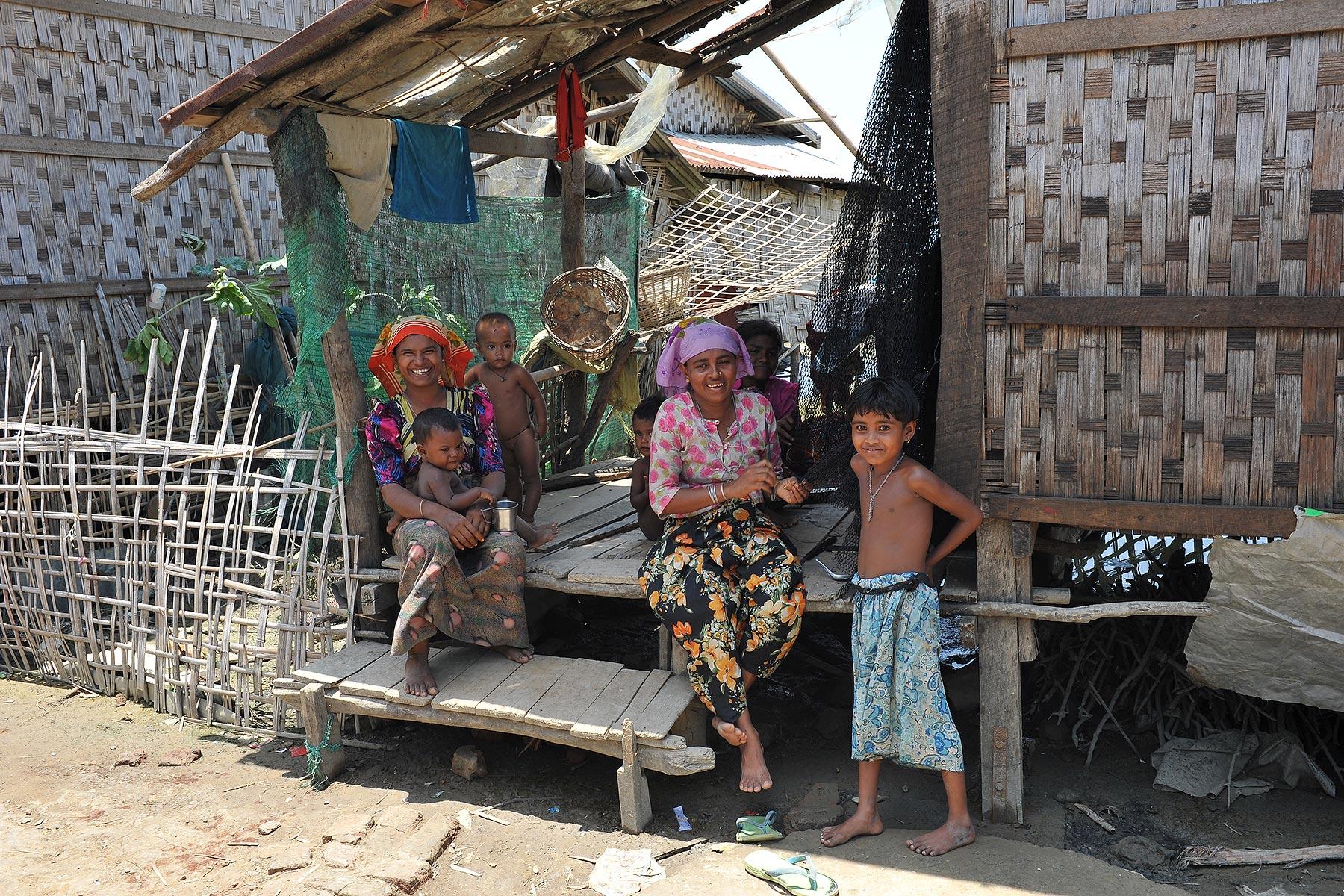 A Rohingya family in an IDP camp in Pauktaw, near Sittwe. LWF, among others, runs informal learning spaces and trains teachers to provide education for the displaced children. Photo: LWF/ C. KÃ¤stner