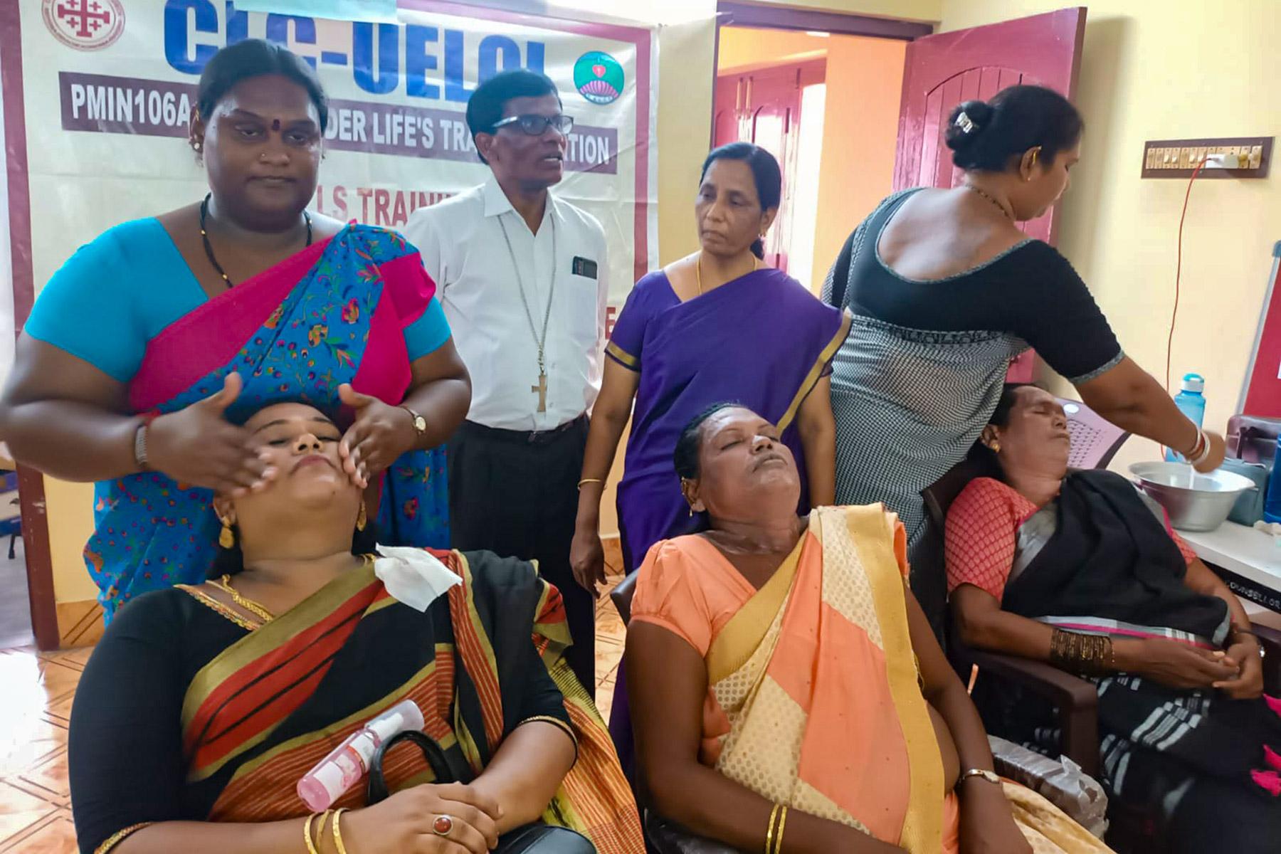 In Chennai, India, the Christ Lutheran Church runs economic empowerment and personal development skills for members of the transgender community. In this photo, Bishop Dr M. Stanley Jose (background, second from left), with some of the students in a beautician course. Photo: CLCÂ 