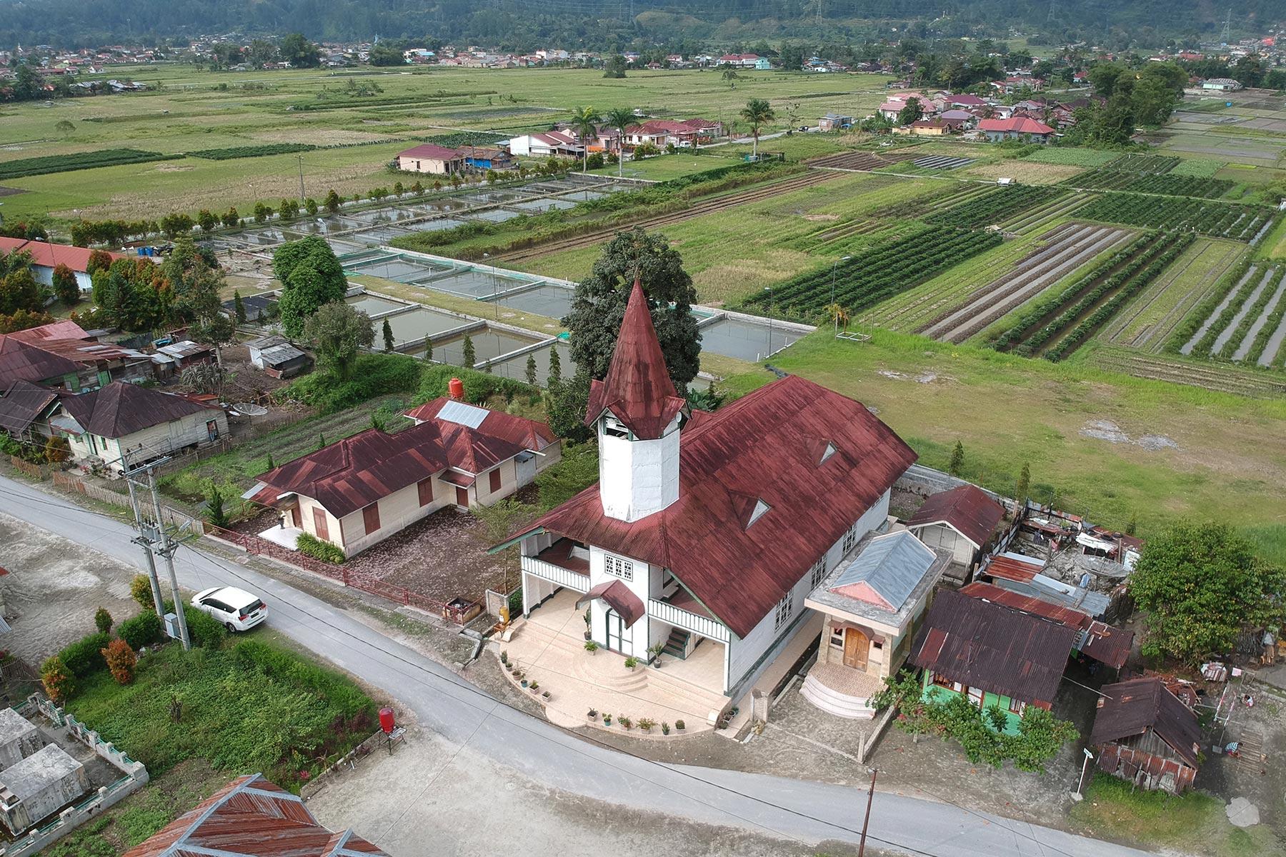 The LWF National Committee in Indonesia installed an internet satellite tower on the properties of four Lutheran churches in remote areas to assist online learning. Church pictured is HKBP. Photo: by Andi Gultom/KNLWF.