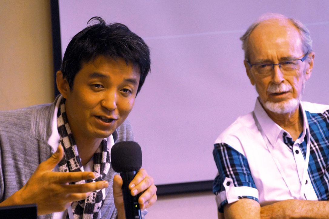 Japanese theologian Rev. Dr Arata Miyamoto speaks at the interfaith consultation where Pof. Notto R. Thelle from Norway (right) encouraged openness to the wisdom and experiences of other religions. Photo: LWF/I. Benesch