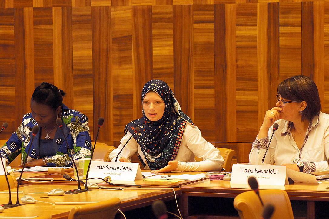 Olga Tshiwewe (WCC), Iman Sandra Pertek (IRW) and Dr Elaine Neuenfeldt (LWF, from left) discuss during the side event on violence against women at the Human Rights Council. Photo: LWF/C.KÃ¤stner
