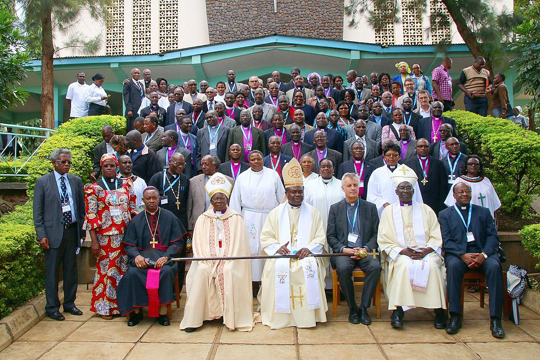 Tanzanian and global Lutheran church leaders gather with other heads of churches in Africa outside the Moshi Town Cathedral. Photo: LWF/Allison Westerhoff 