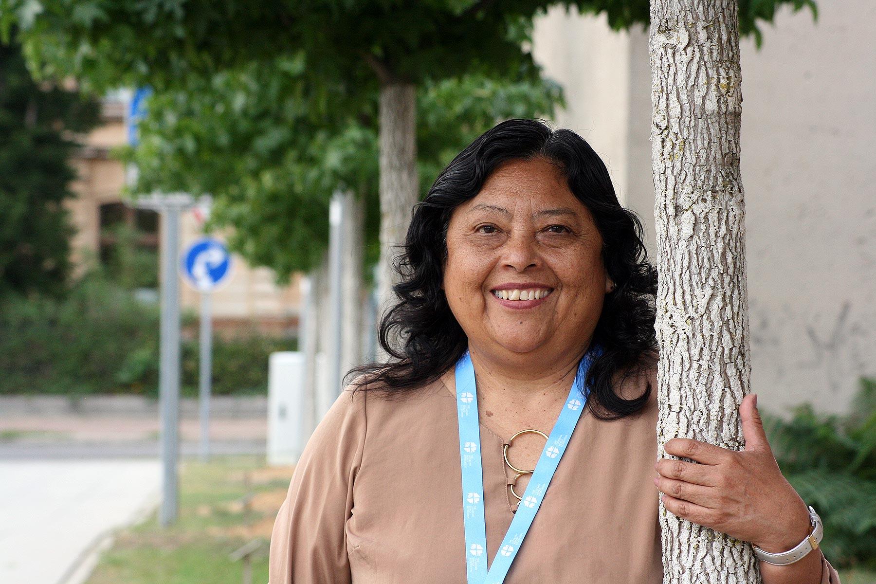 Rev. Adita Torres Lescano, Pastor President of the Lutheran Church of Peru, visiting the tree planted by representatives of her church in the Luthergarten in Wittenberg. This Reformation 2017 project symbolizes the ecumenical relationships of Christian churches worldwide through 500 trees creating a living memorial. Photo: LWF/A. WeyermÃ¼ller
