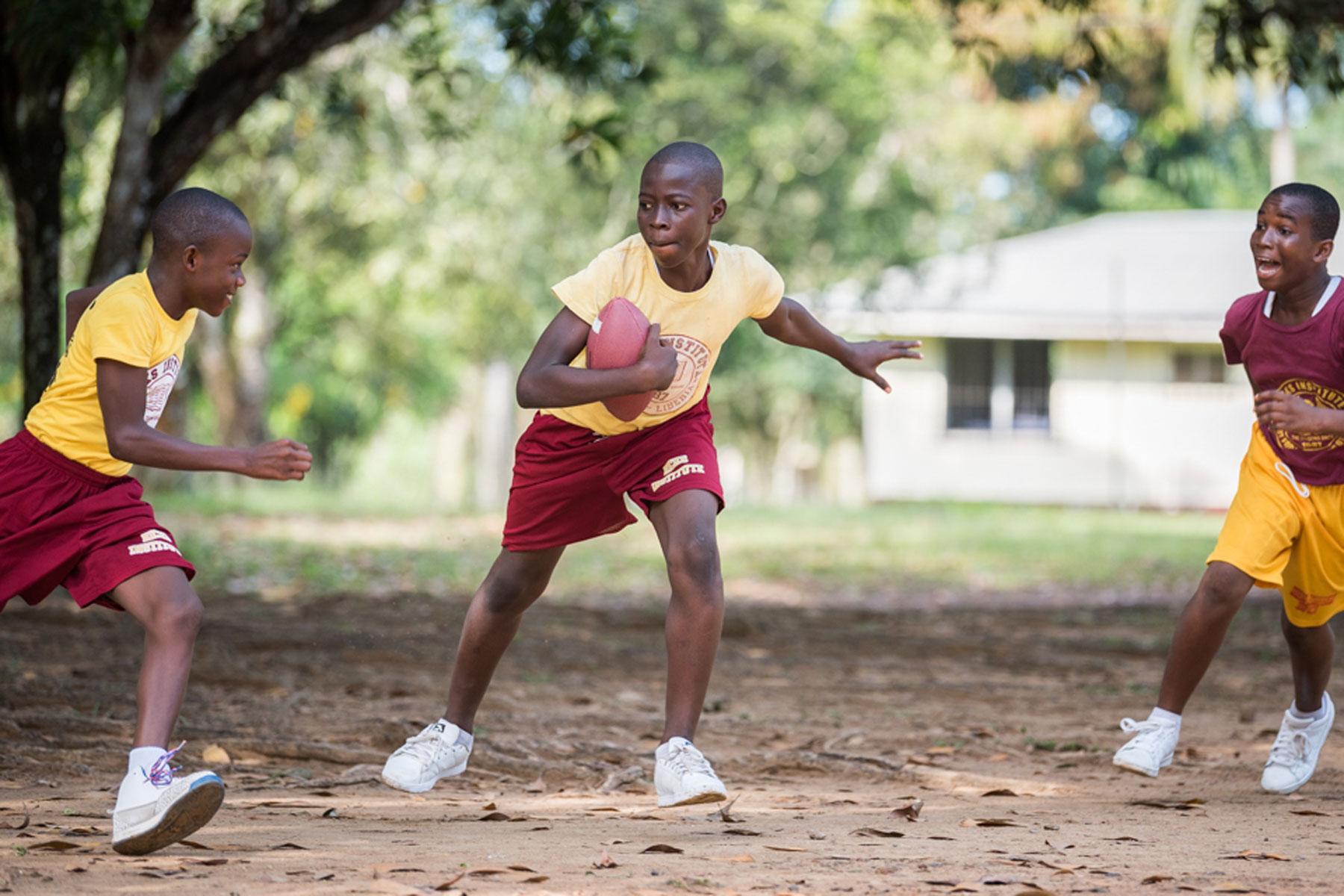 A group of students at Ricks Institute play football in the schoolyard. All photos: LWF/Albin Hillert