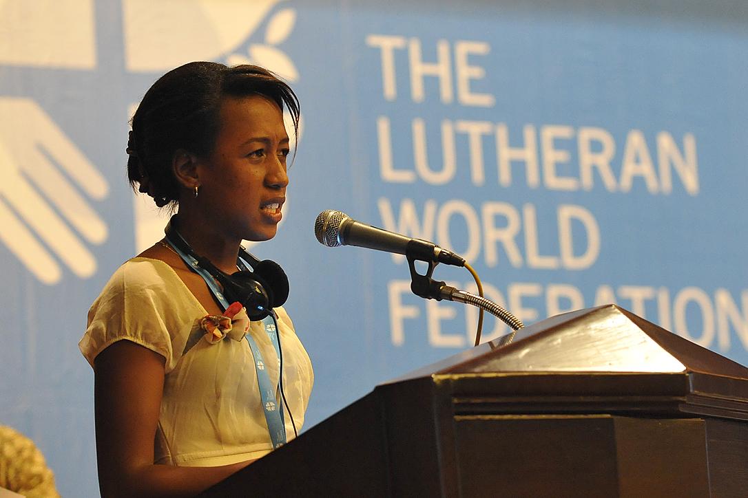 Mami Brunah Aro Sandaniaina of the Malagasy Lutheran Church asks the Council how their churches engage young people who have taken part in LWF youth programs. Photo: LWF/M. Renaux