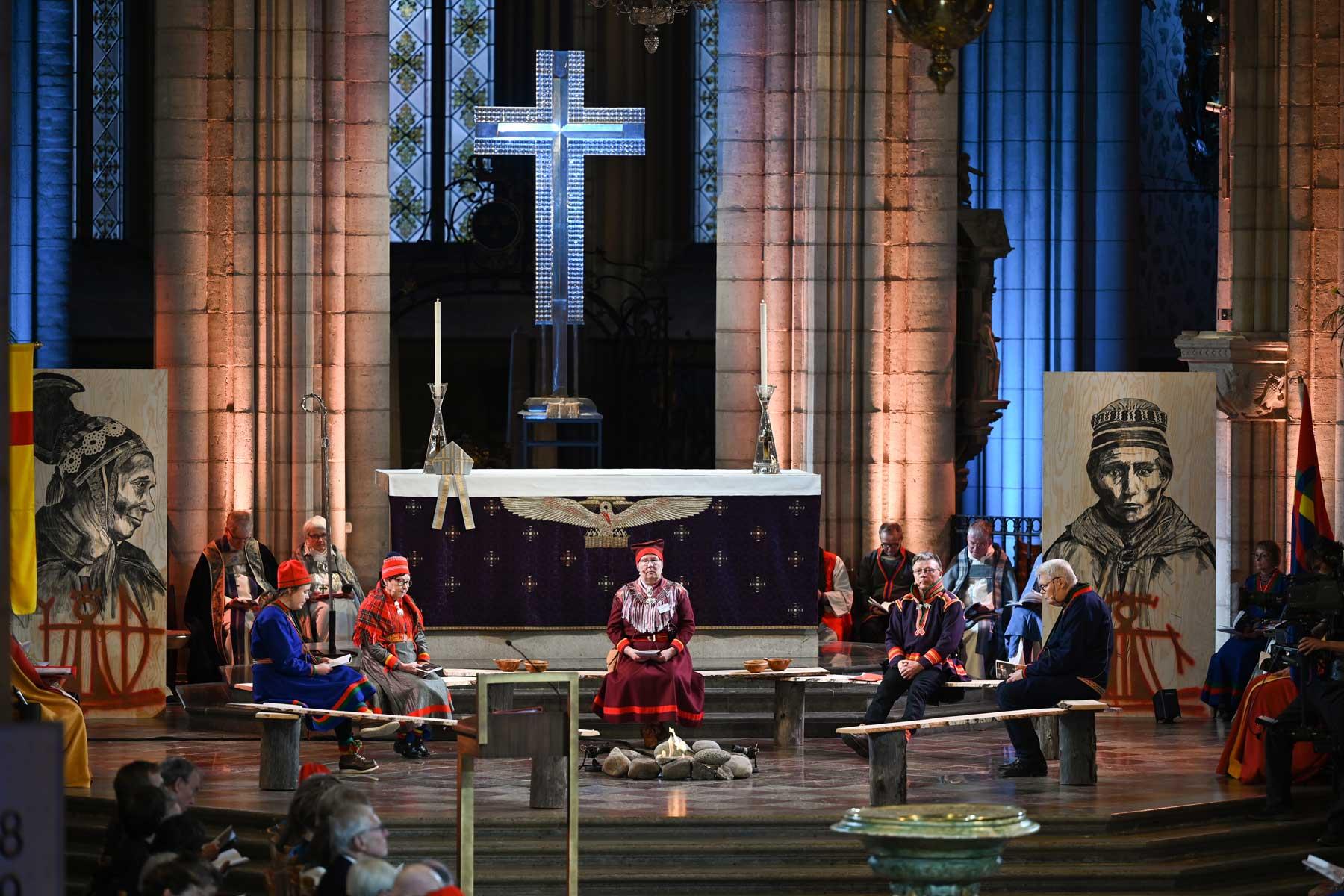 Archbishop Jackelén sits behind Sami leaders in Uppsala Cathedral during an official apology from the Church of Sweden. Photo: Magnus Aronson / Icon