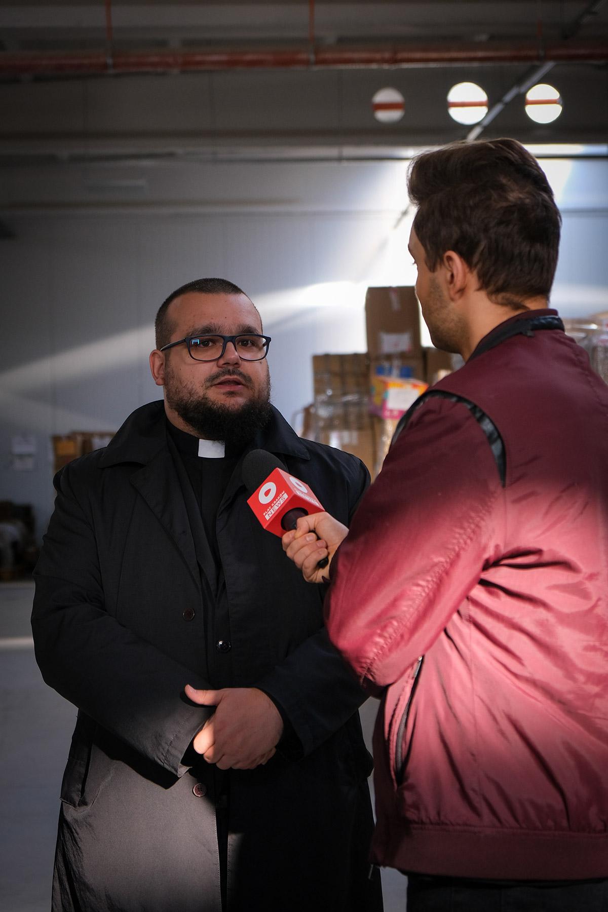  Łukasz Ostruszka, Pastor of the Evangelical-Augsburg Parish, interviewed by local media. Photo: LWF/ L. Gillabert 