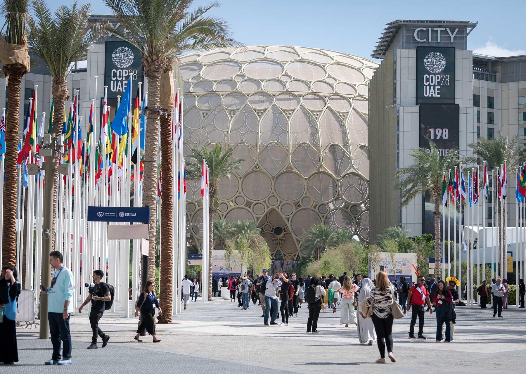 30 November 2023, Dubai, United Arab Emirates: People begin to gather at Expo City in Dubai, venue for COP28, the United Nations climate summit 2023. Photo: LWF/Albin Hillert