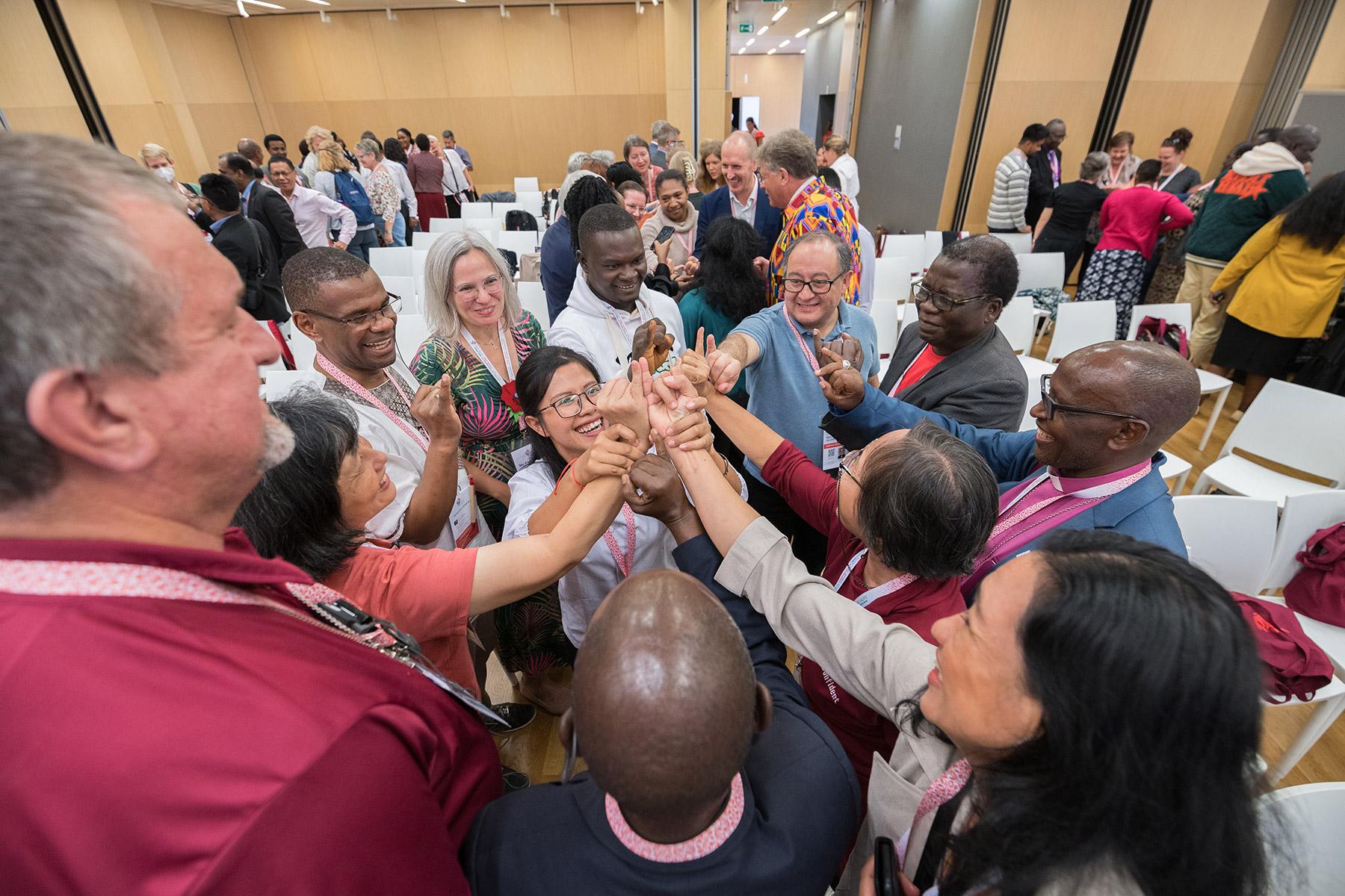 The message of God’s love calls us to go out into the world and to serve all people." In the photo, LWF member church delegates take part in a joint exercise, prior to the start of the Thirteenth Assembly in Kraków, Poland, last September. Photo: LWF/Albin Hillert 
