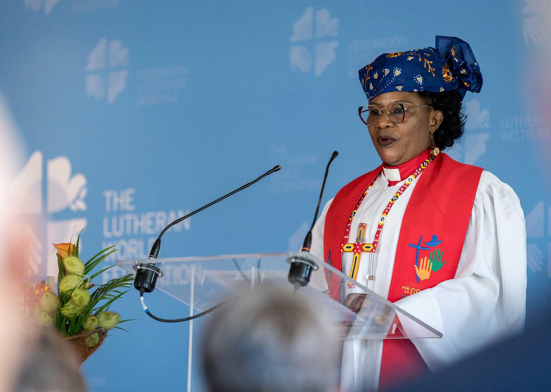 Cameroonian pastor Rev. Dr Jeannette Ada Epse Maina, delivering the sermon at the opening service of the 2024 Council meeting at Chavannes-de-Bogis, near Geneva, Switzerland. Photo: LWF/Albin Hillert