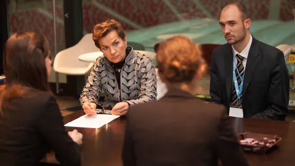 Cristiana Figueres speaking with the LWF COP19 delegation. Photo: LWF/Sean Hawkey