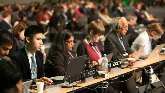 Many of the 15,000+ participants at the UN climate change conference are civil society. Photo: Sean Hawkey