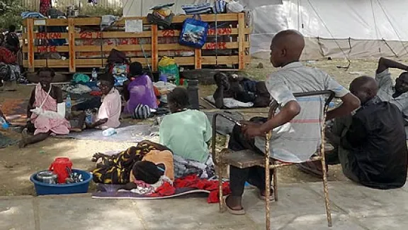 The LWF is providing food, water, blankets and other assistance to victims of the recent inter-ethnic attacks in Jonglei State, like these wounded taking shelter outside an overcrowded Juba hospital. Â© LWF