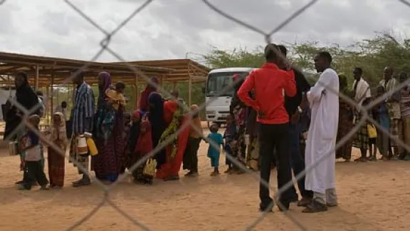 New arrivals from Somalia wait to be registered at Dadaab during the peak influx in August 2011. Â© LWR/Jonathan Ernst