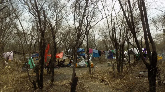 Refugees from South Sudan in makeshift shelters, awaiting land allocation in Palorinya settlement. The large numbers of daily arrivals has slowed down the registration process. Photo: LWF/S. Nalubega