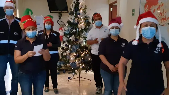 The LWF World Service Central America team, performing a hymn in the main office in San Salvador. Photo: LWF Central America