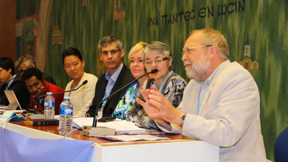 Bishop Niels Henrik Arendt, right, Evangelical Lutheran Church in Denmark, addressing LWF Council participants during the panel presentation on June 14, 2013. Bishop Arendt died on August 23, 2015. Photo: LWF/Maximilian Haas