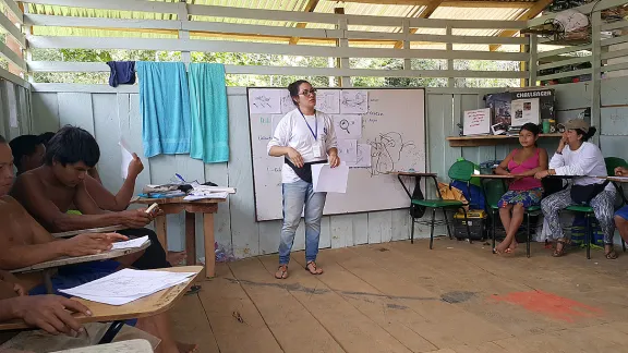 Yuri Guzman conducting a training session in Choco. She says humanitarian work allows her to offer solutions to the problems of people living in a conflict zone. Photo: LWF Colombia