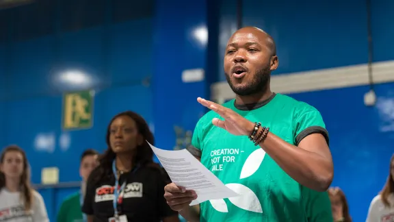 LWF Council member Khulekani Sizwe Magwaza advocating for climate justice during COP25 in Madrid, Spain, in 2019. Photo: LWF/Albin Hillert