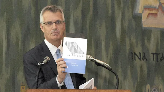 At the LWF Council 2015 meeting, General Secretary Rev. Dr Martin Junge introduces the series of booklets, Liberated by God's Grace. Photo: LWF/Helen Putsmanâ