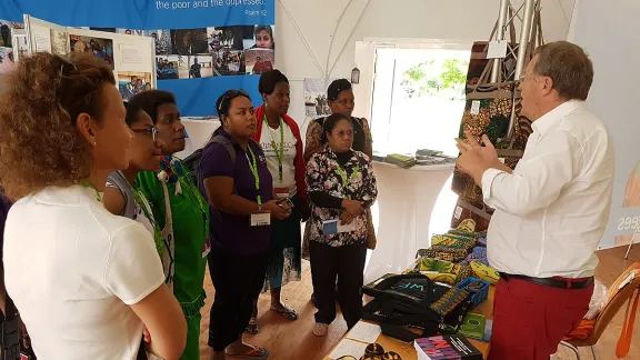 LWF World Service staff welcome visitors at the Heaven's Tent in Wittenberg. Photo: LWF/C.Kaestner