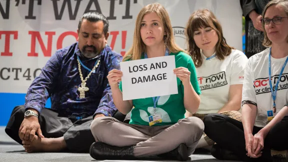 Erika Rodning from the Evangelical Lutheran Church in Canada illustrates the lack of balance in finance of the global climate response during a stunt at COP25 in Madrid, Spain. Most of the finance is put into mitigation, some into adaptation, but very little into loss and damage, even though âthat's where the people are