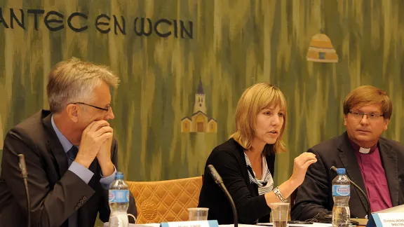 Finance Committee chair, Christina Jackson-Skelton, centre, commended the LWF leadership for increasing financial stability. Photo: LWF/Helen Putsman