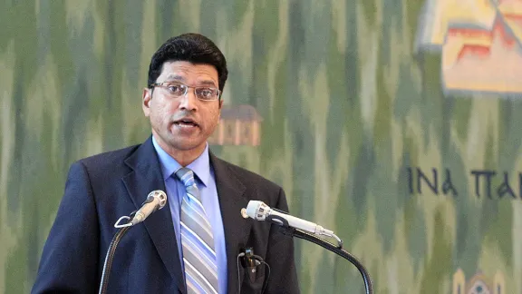 Michael Ram, chairperson of the Committee for Advocacy and Public Voice, presents the committee's report at the June 2015 LWF Council meeting in Geneva. Photo: LWF/Helen Putsman