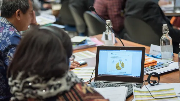 Members of the LWF Council follow the finance report during the 2018 meeting in Geneva. Photo: LWF/Albin Hillert