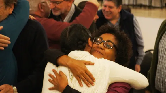 Rev. Marjory Slagtand, board chairperson of the Evangelical Lutheran Church in Suriname, embracing Roxana Gutierrez from the Bolivian Evangelical Lutheran Church. The Surinamese church will host the LWF Pre-Assemblies for the LAC and North American regions. Photo: LWF/Eugenio Albrecht 