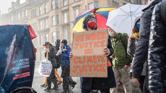 March for the climate during COP26 in Glasgow. Photo: LWF/Albin Hillert