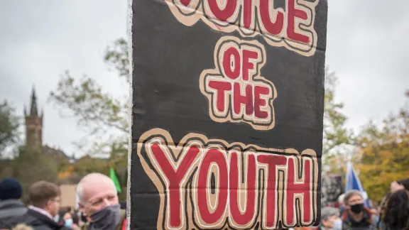 Young people make their voices heard at the COP26 summit in Glasgow, Scotland in November 2021. Photo: LWF/A. HillertÂ 