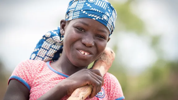 13-year-old Mairamou Zra and her family work their field, sowing groundnut near the Minawao camp for Nigerian refugees, Cameroon. The family forms part of the host community in the area around the camp, which hosts some 58,000 refugees from North East Nigeria. Photo: LWF/Albin Hillert