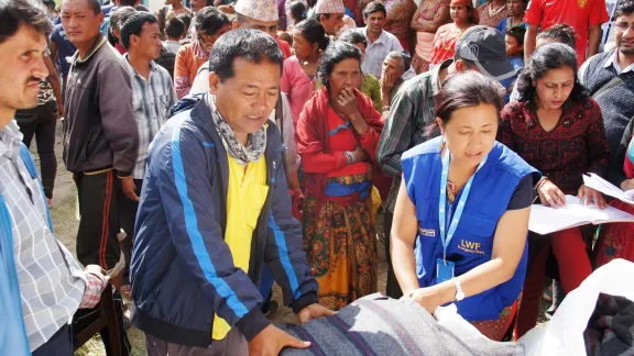 LWF Nepal staff distribute blankets and other items for emergency shelter in Nepal after the earthquake in 2015. Although many of them were affected themselves, all colleagues reported for duty and went out to support those who had lost even more. Photo: LWF/ C. KÃ¤stner 