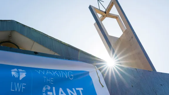 A Waking the Giant banner at Saint Peter Lutheran Church in Monrovia, Liberia. Photo: LWF/Albin Hillert