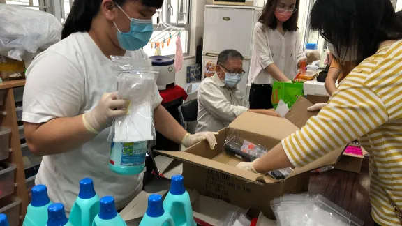 Volunteers at the Eternal Life Lutheran Church in Hong Kong prepare supplies to distribute to local people in need. All Photos: ELCHK