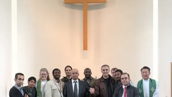 Rev. Toshiki Toma (right) and Rev. KristÃ­n ÃÃ³runn TÃ³masdÃ³ttir (third from left) with the congregation at Laugarnes-church in Reykjavik. Photo: Rev. Hjalti JÃ³n Sverrisson