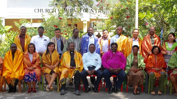 Indian shawls, a gift from UELCI staff to delegates from Africa and Asia, jointly reviewing the LWF HICD frameworks, during the meeting in Chennai. Photo: LWF/Immanuel