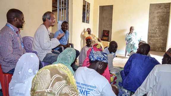 Rev. Dr Sivin Kit and World Service Emergency Program Coordinator Clovis Mwambutsa in dialogue with the Muslim Chief of a community in Cameroon hosting refugees from neighbouring countries. Photo: LWF/Moise Amedje