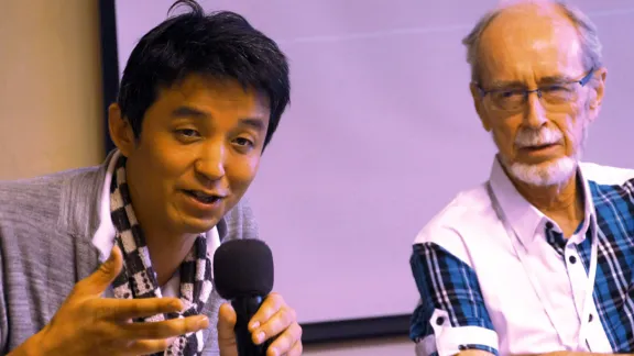 Japanese theologian Rev. Dr Arata Miyamoto speaks at the interfaith consultation where Pof. Notto R. Thelle from Norway (right) encouraged openness to the wisdom and experiences of other religions. Photo: LWF/I. Benesch