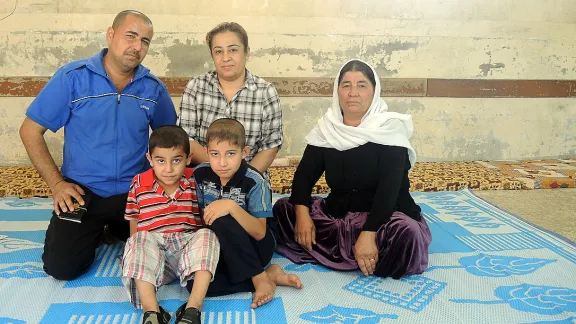 Amer Abdullah, left, fled the town of Baashiqah with his family. They are taking shelter in a school in Northern Iraq. Photo: Anne Dreyer/ACT-DKH