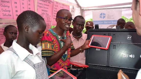 Students from LWFâs Angelina-Jolie school in Kakuma refugee camp with tablets in computer class. Photo: LWF