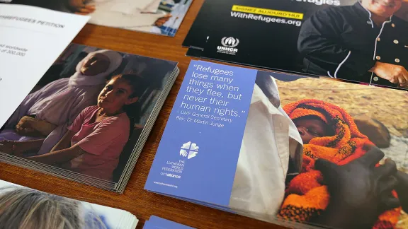 Refugees lose many things, but never their human rights: LWF and UNHCR visibility material at the panel discussion. Photo: LWF/ A. Danielsson