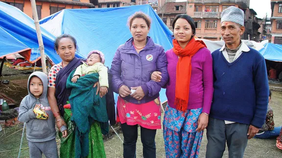 The Kunda family, in the camp which sits just opposite their house. Credit: LWF/C KÃ¤stner