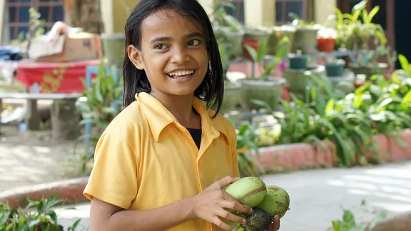 Climbing Mango trees for some extra sweets is part of a childhood in the HKBP orphanage in Pematang Siantar. Photo: LWF/ C. KÃ¤stner